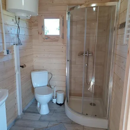 Деревянный коттедж Nad Stawem *