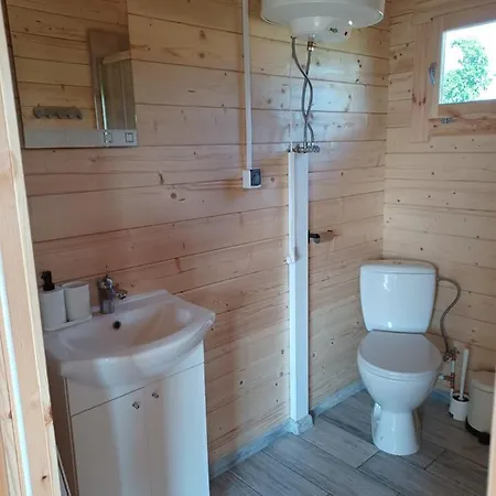 Деревянный коттедж Nad Stawem *