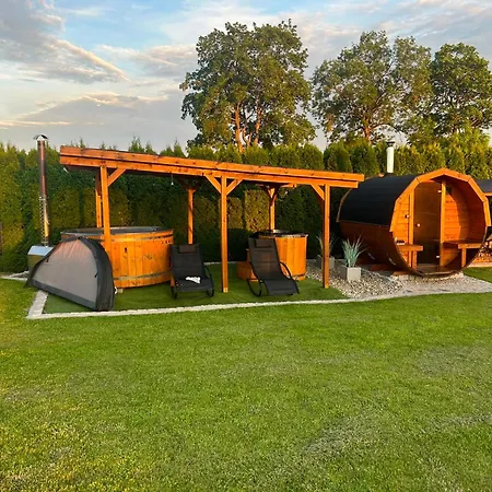 Деревянный коттедж Nad Stawem